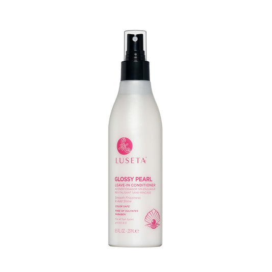 Luseta Glossy Pearl Leave-In Conditioner bottle pour adds shine and moisture.