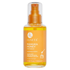 Luseta Manuka Honey Hair Oil bottle highlights nourishing formula for smoother, frizz-free hair.