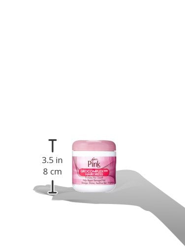 Luster's Scurl Pink Gro Complex being applied to scalp for smooth, comfortable care.