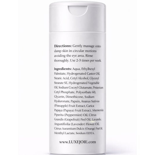 LuxeJoie Papaya Enzyme Polish creamy texture on finger demonstrates gentle exfoliation for smoother skin