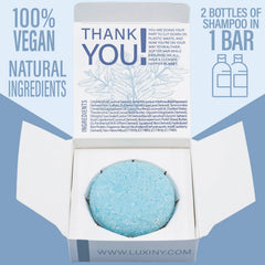 Luxiny Bay Rum Shampoo Bar held in hand shows compact, travel-ready cleansing