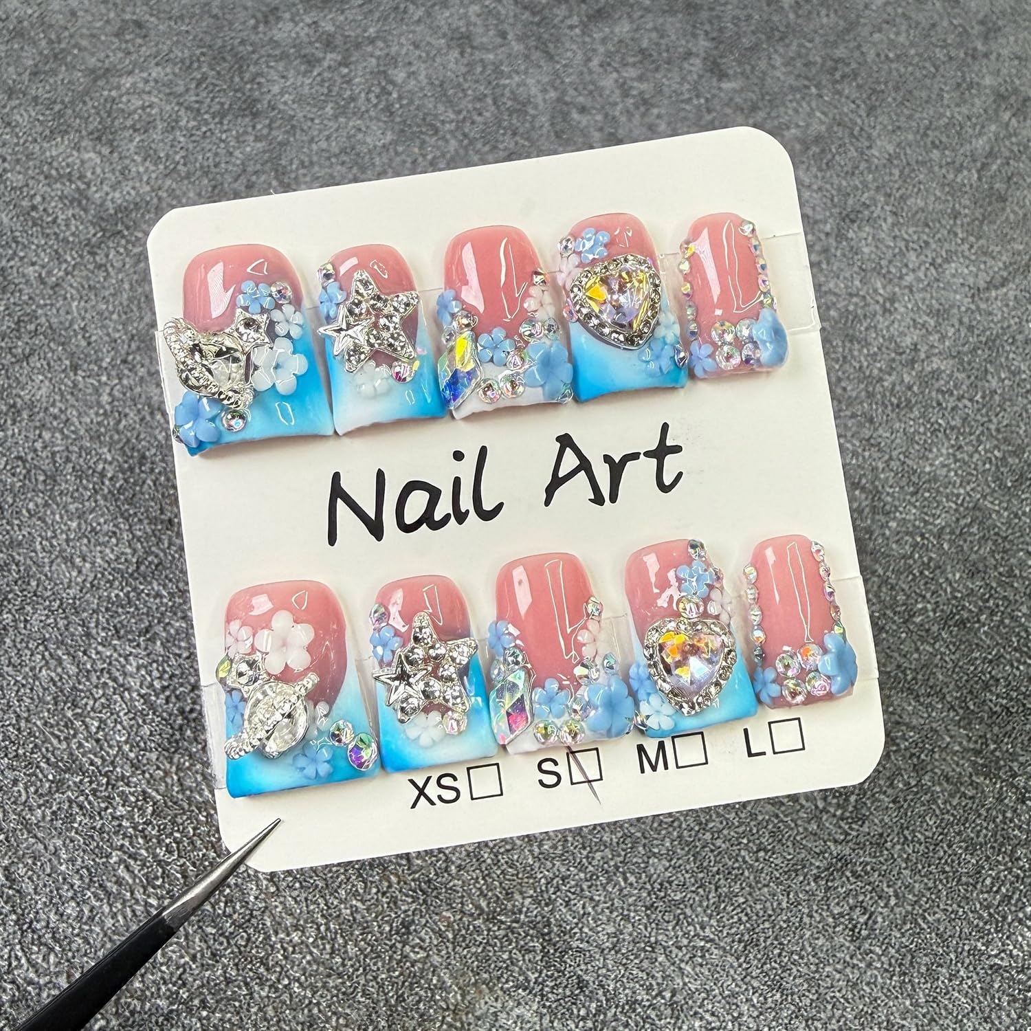 Luxury Press on Nails featuring 3D rhinestones and star accents for a luxe sparkle