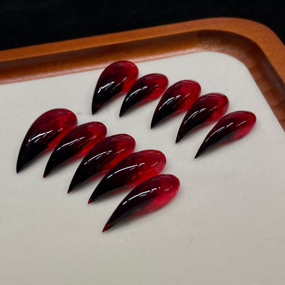 Close-up of eagle claw design on luxury press on nails