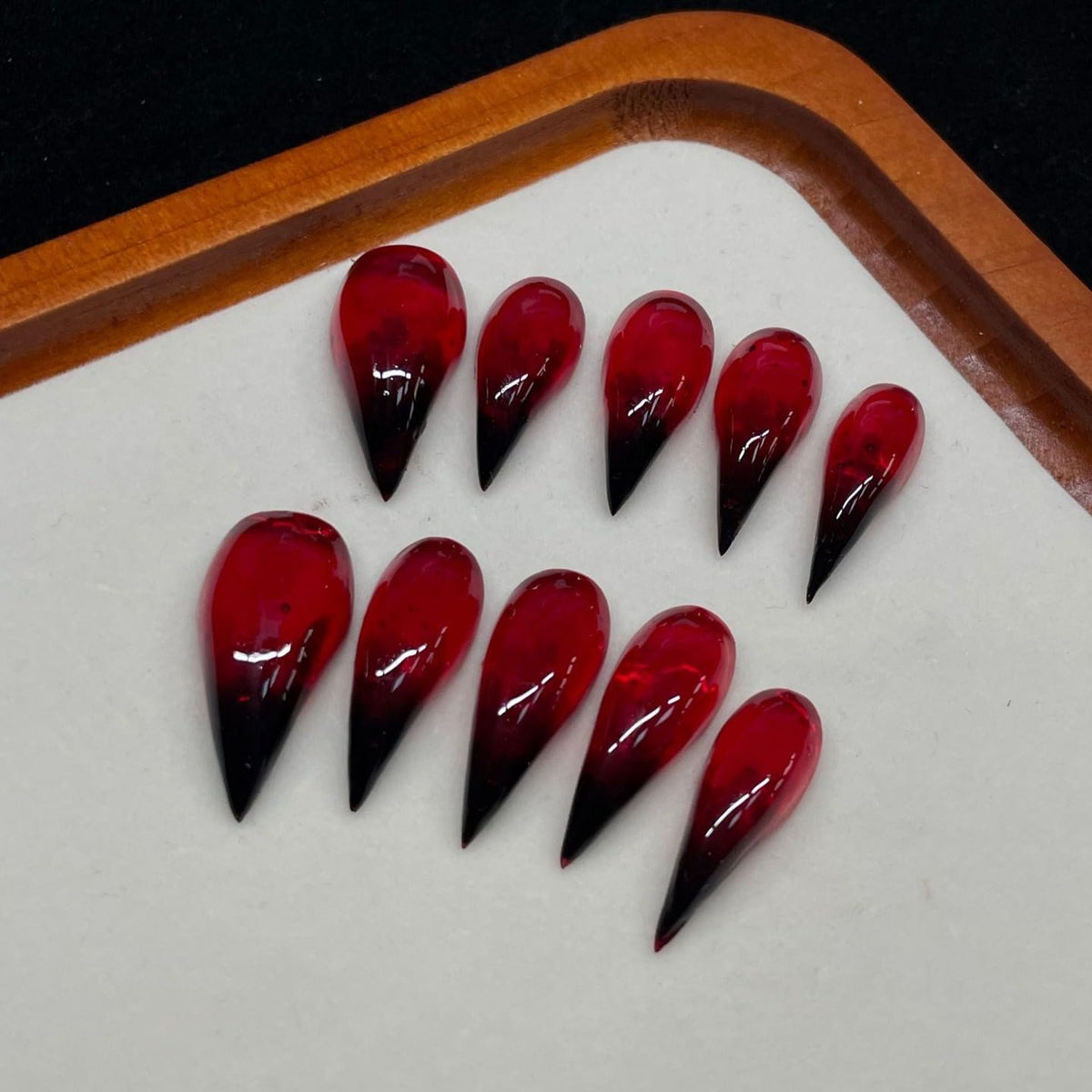 Luxury handmade press on nails: long-stiletto eagle claw in red-black gradient for a bold look