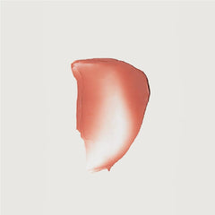 M Flush Balm Cream Blush spreads velvet texture for smooth, even application.