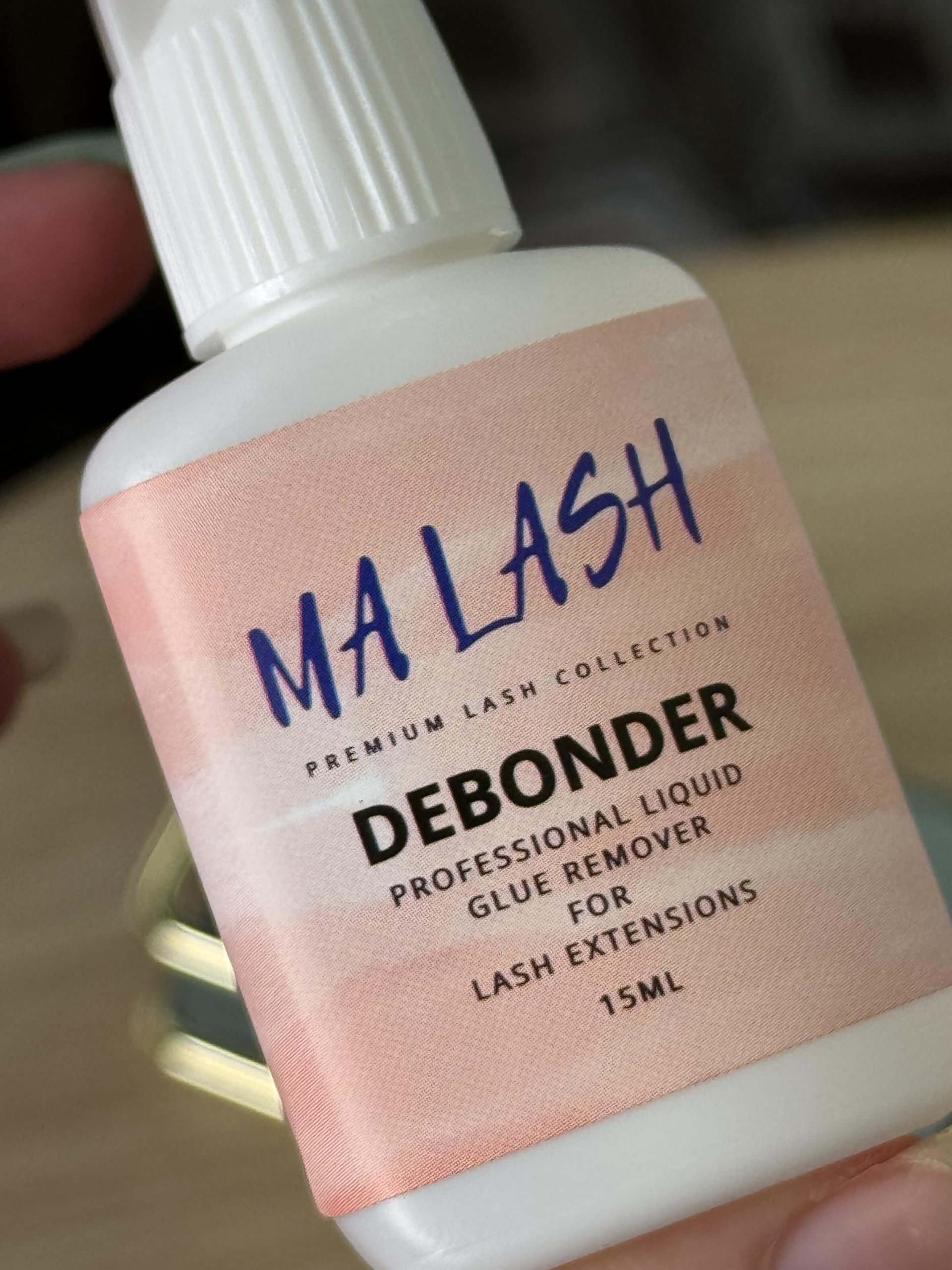 MA LASH debonder liquid label closeup highlights branding and usage directions