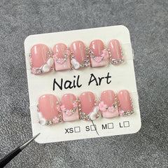 MABKJLF ABS reusable nails in glossy pink finish for quick manicures.