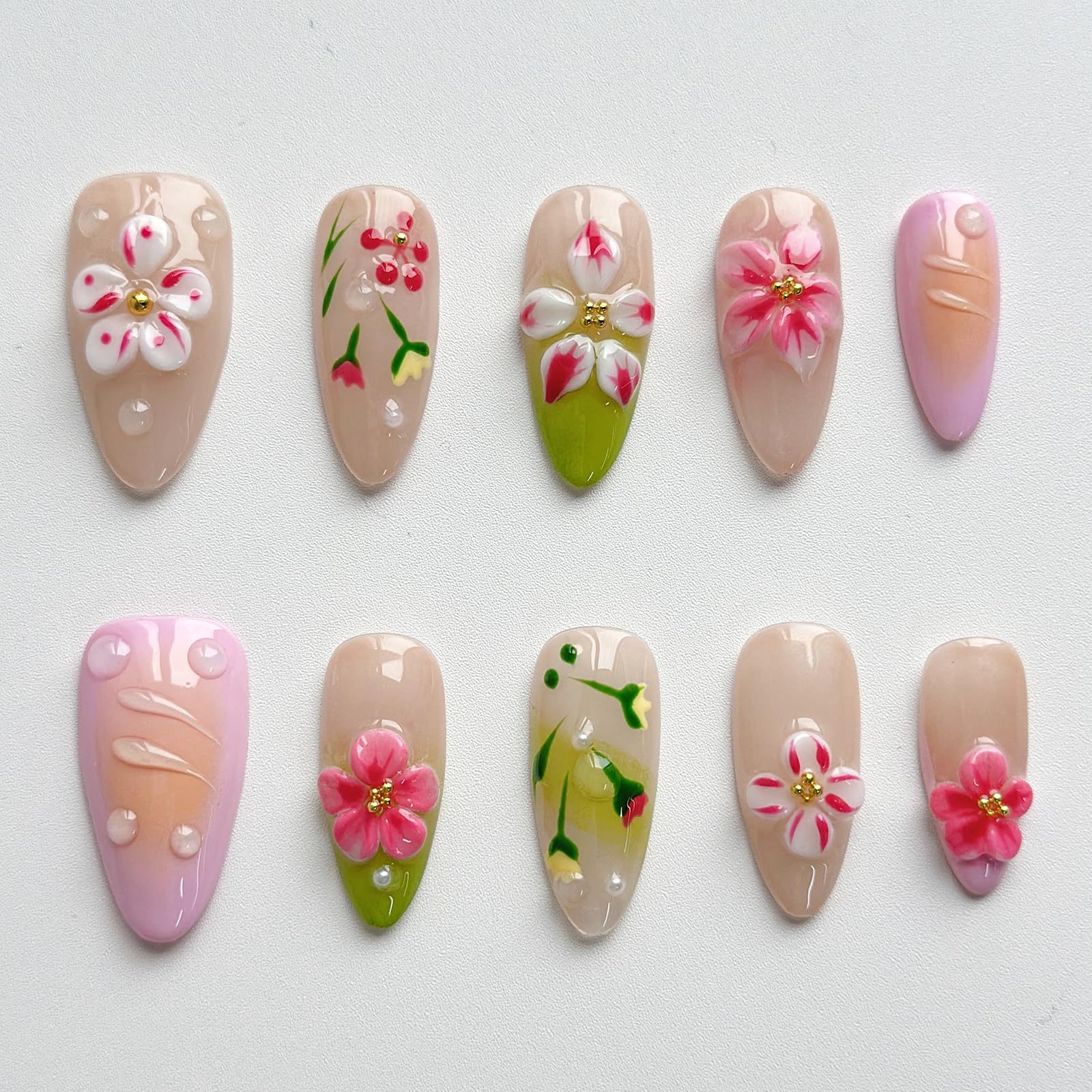 MABKJLF medium almond nails featuring a 3D design for added dimension.