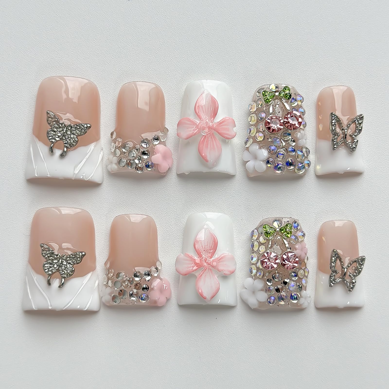 MABKJLF Luxury Press On Nails in short duck design on hand for stylish at-home wear.