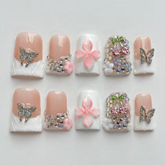 MABKJLF Luxury Press On Nails in short duck design on hand for stylish at-home wear.