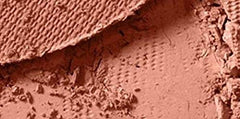 MAC Coppertone blush on cheeks for natural warmth and day-long glow