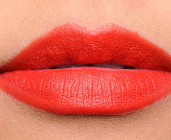 MAC Dangerous swatches on arm to show rich color in natural light