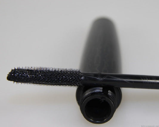 Close-up of MAC mascara brush for dramatic lash definition.