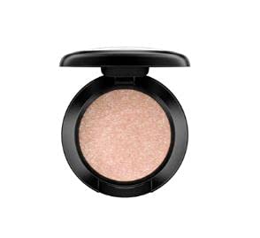 MAC Honey Lust Lustre eyeshadow in bronze-dipped peach delivers rich color for all-day wear.
