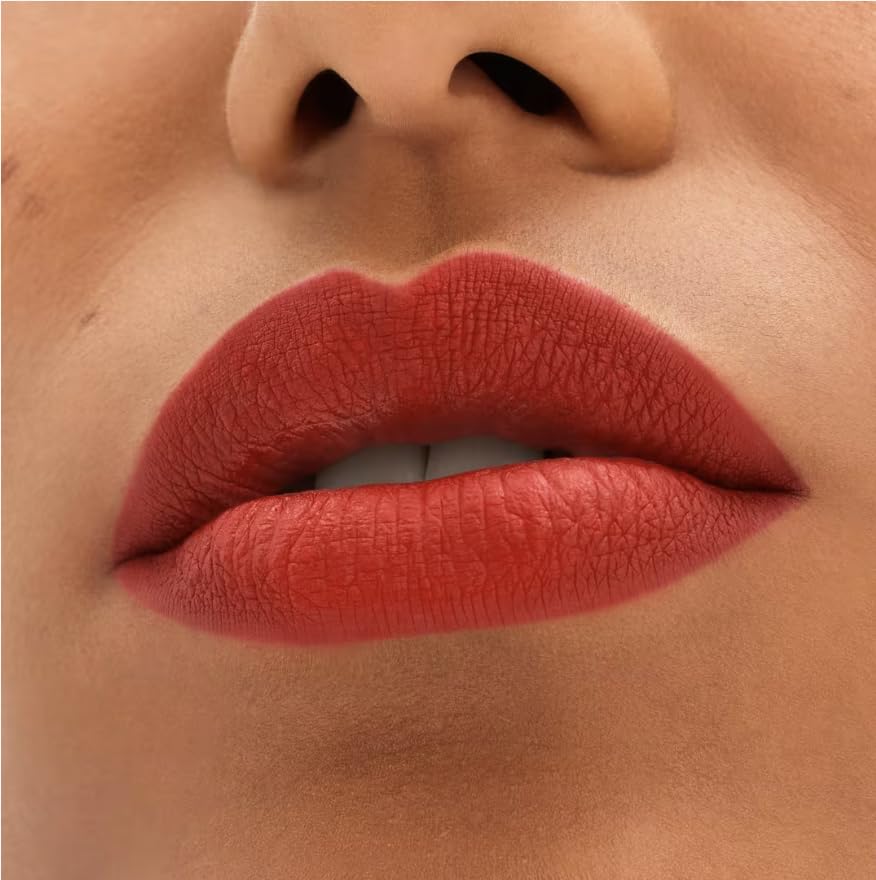 MAC Locked Kiss Gutsy lip application demonstrates creamy glide for comfortable color