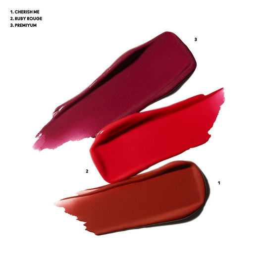 MAC Mini Lustreglass Premiyum — bold red glow for evenings out.