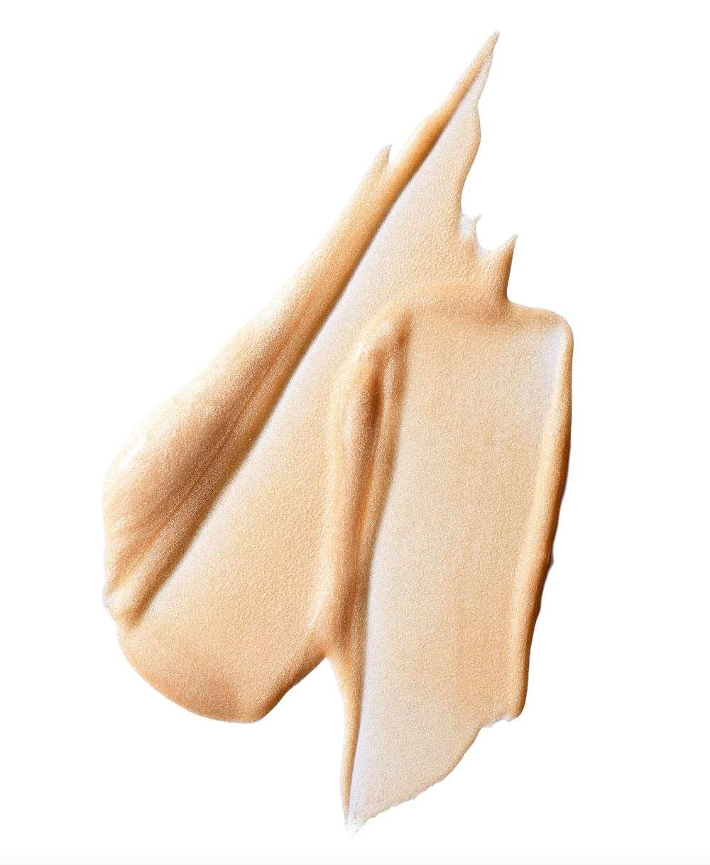 Direct cheekbone application of MAC Lightstruck for radiant highlight