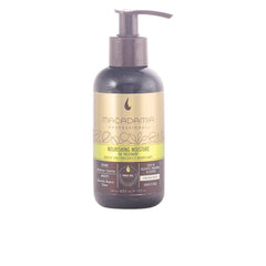 Macadamia Professional Nourishing Repair Oil bottle pour for frizz control and UV protection.