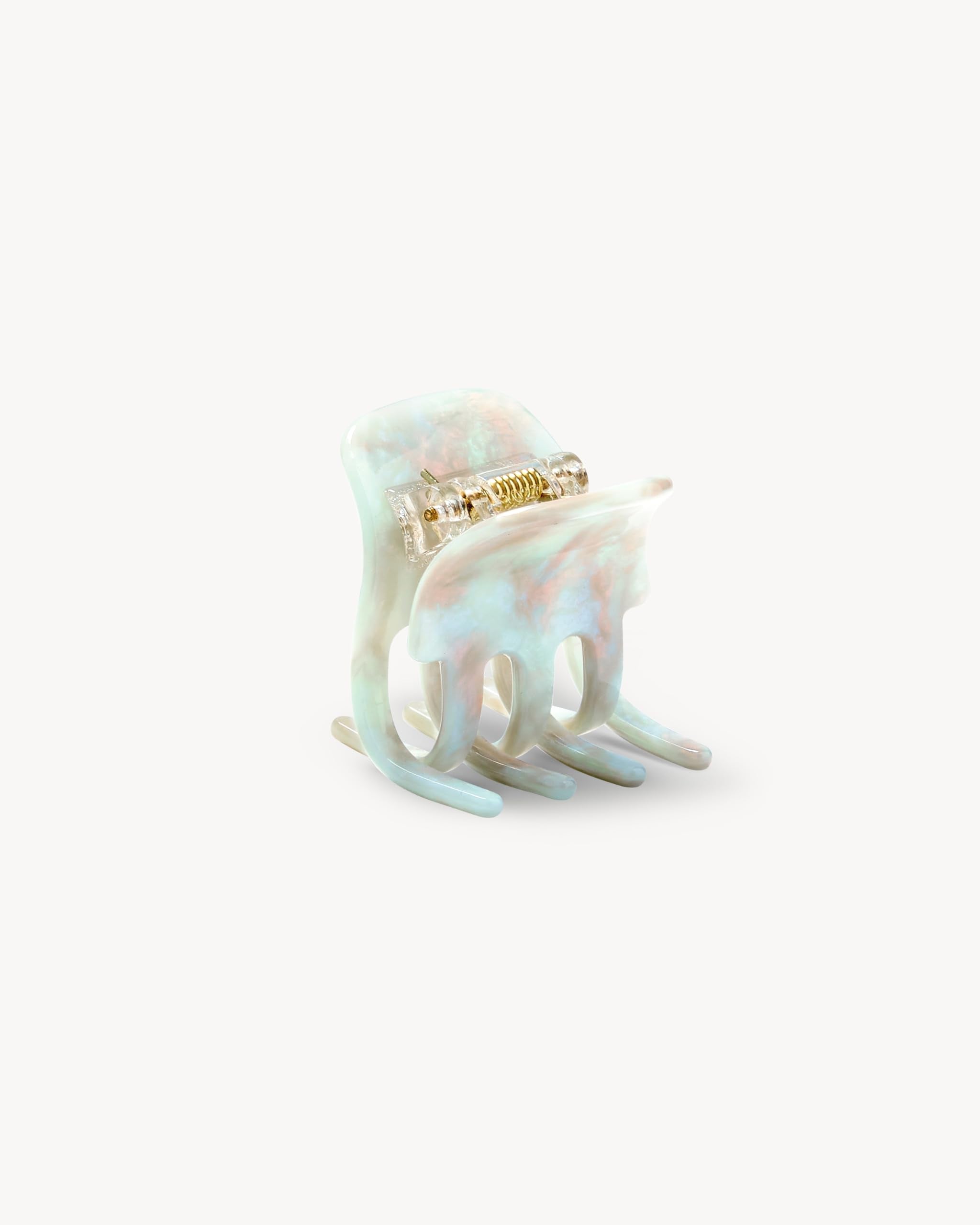 MACHETE Astral Mint mini claw clip ideal for on-the-go updos and versatile looks.