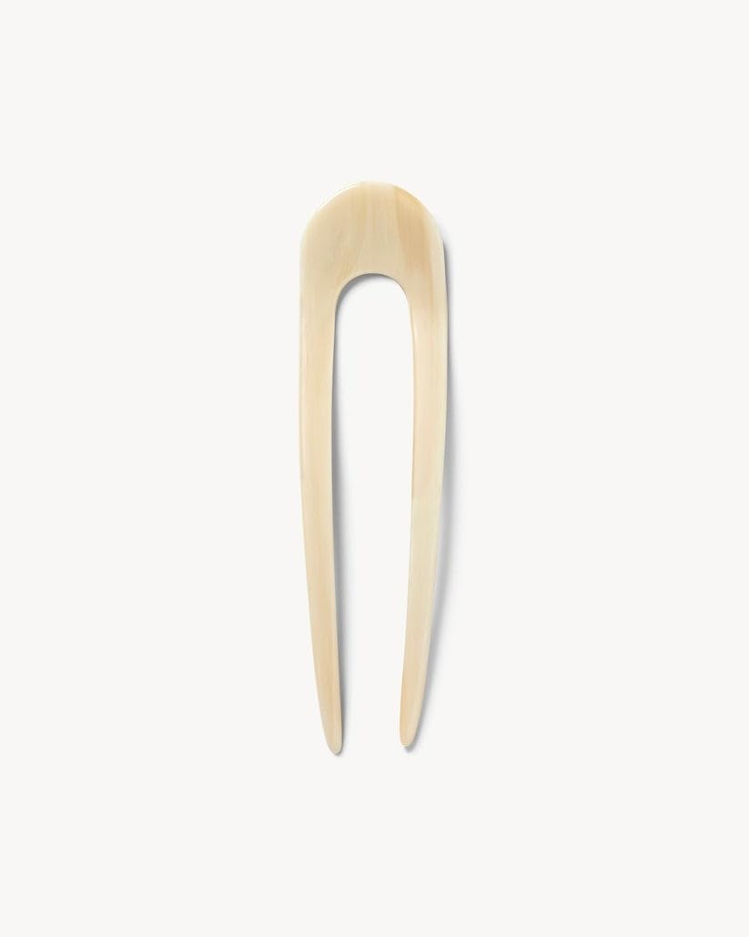 MACHETE hair pin with glossy finish highlights luxurious shine while keeping hair in place.
