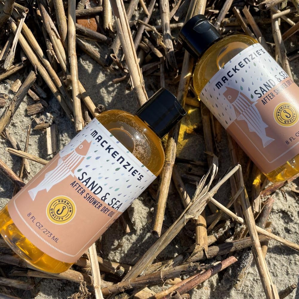 Sand & Sea dry oil on bathroom shelf for daily skin care.