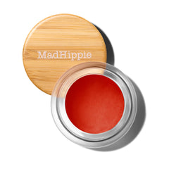 Mad Hippie Cheek & Lip Tint Poppy in a compact jar for on-the-go touch-ups.