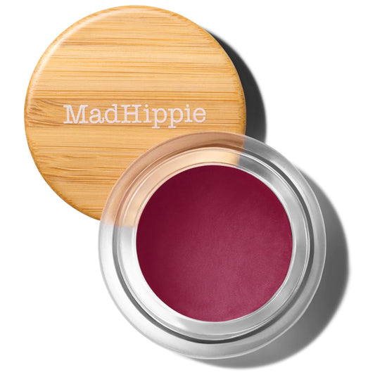 Mad Hippie Plum Cheek & Lip Tint in a compact glass jar for on-the-go hydration and color.