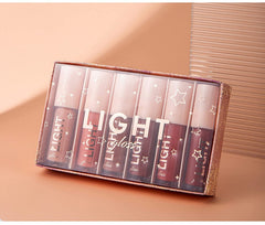 MAEPEOR lipgloss set displayed on vanity for daily beauty routine.