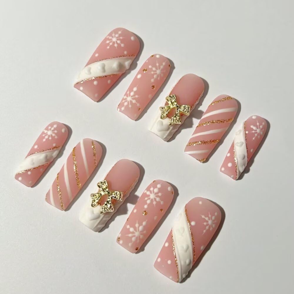 MAGLFELL Christmas press-on nails in square shape with bow accents for festive elegance.