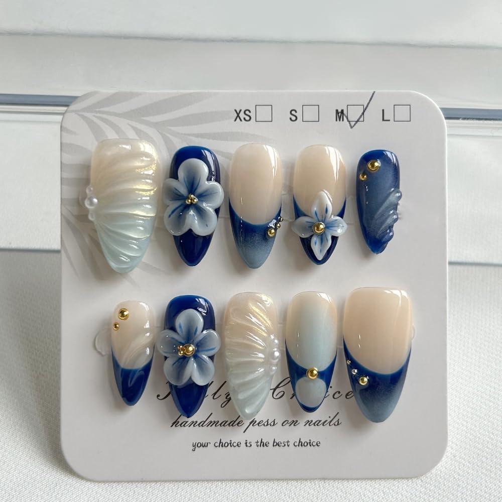 MAGLFELL press on nails in medium almond with bow detail for salon-like results at home