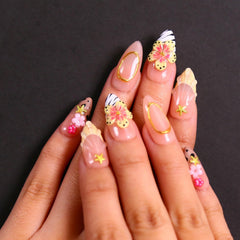MAGLFELL spring press-on nails in almond-3D style for quick at-home salon looks.