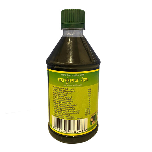Mahabhringaraj Oil label closeup highlighting pure ingredients for improved hair moisture