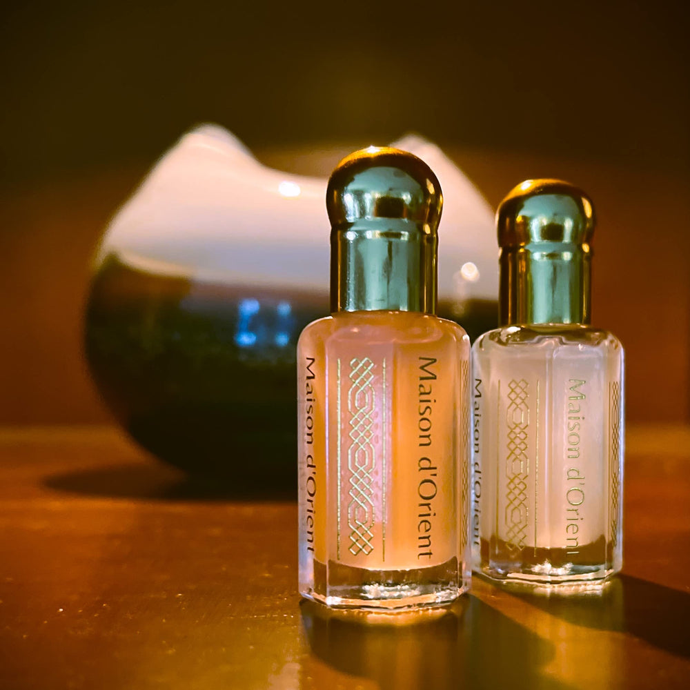 Pink Musk on vanity with soft fragrance ambiance