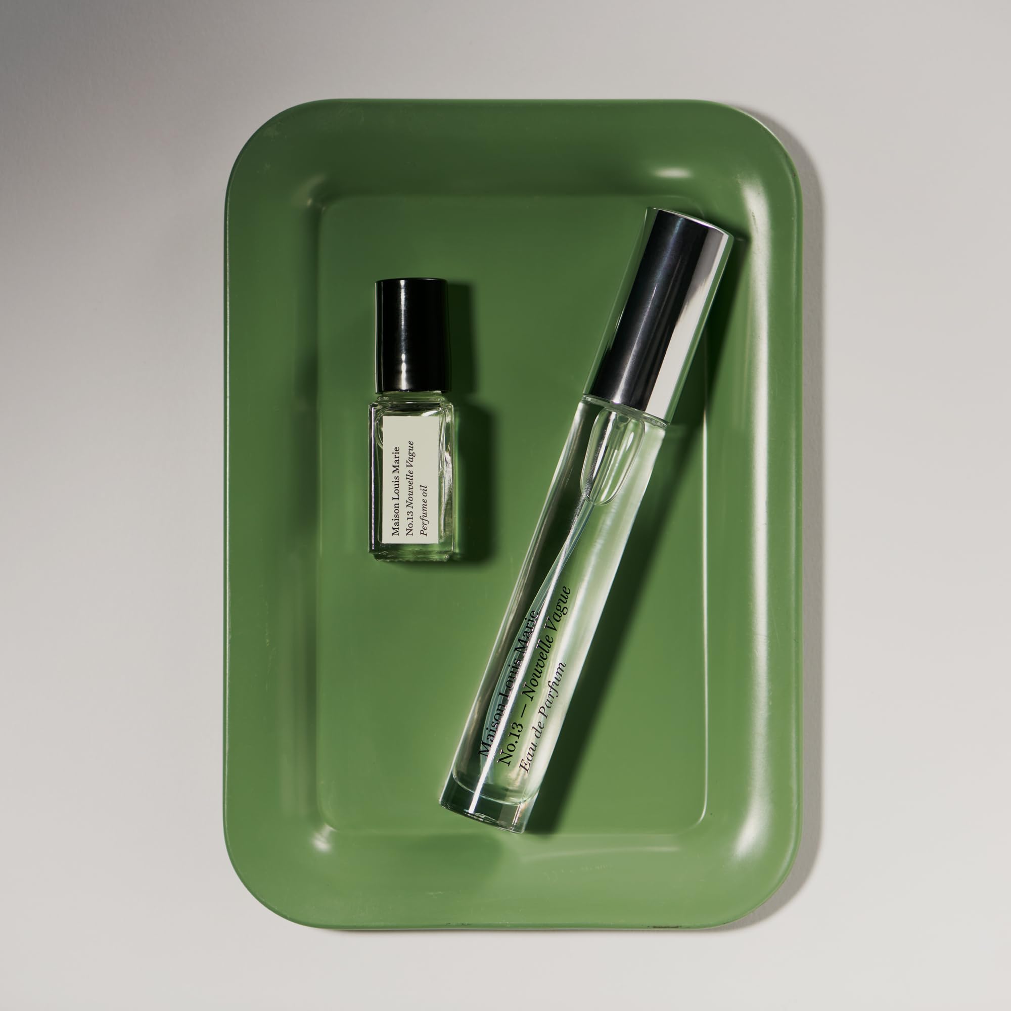 No.13 Nouvelle Vague mini roll-on oil image emphasizes compact size for discreet application.