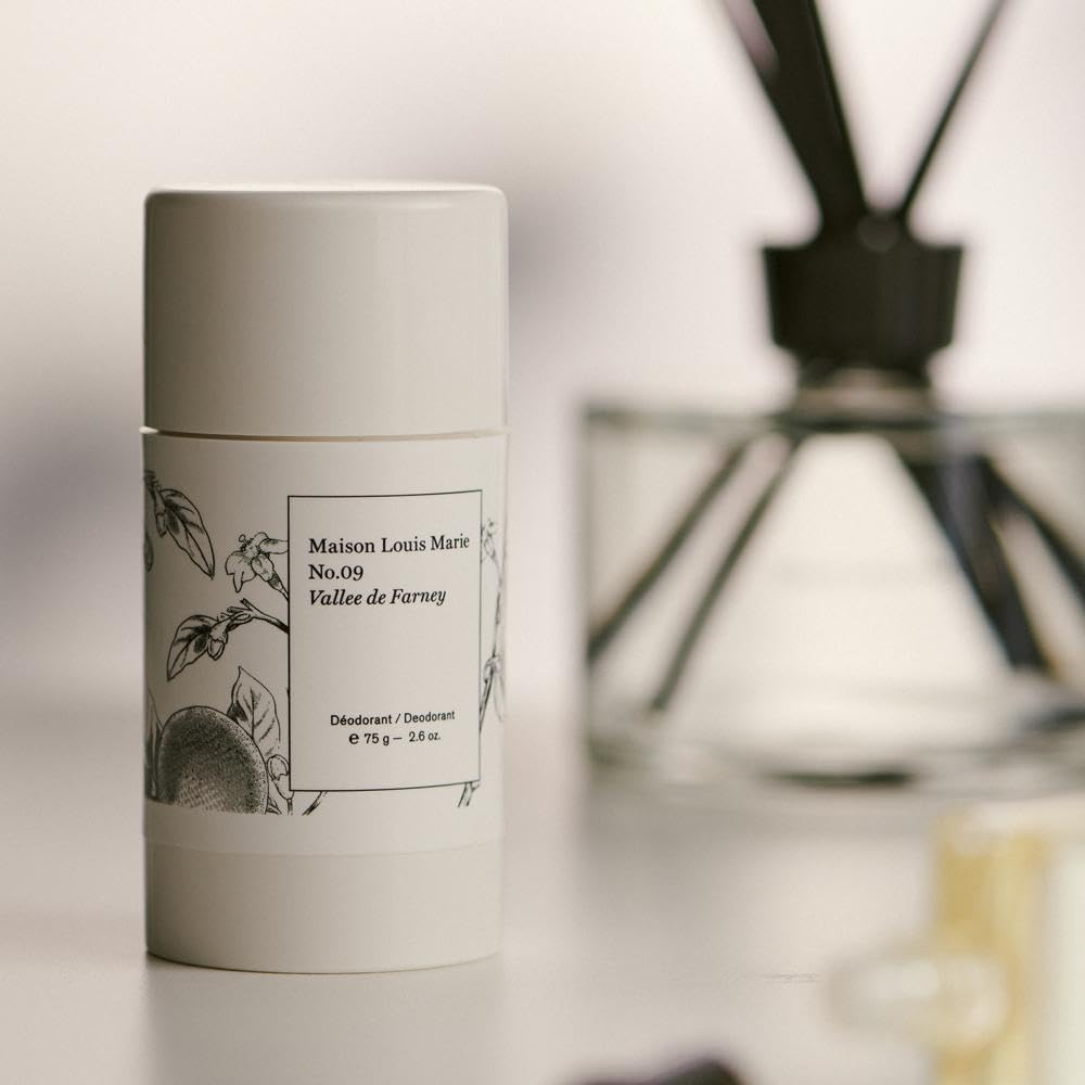 Lifestyle image of a traveler applying Maison Louis Marie No.09 deodorant.