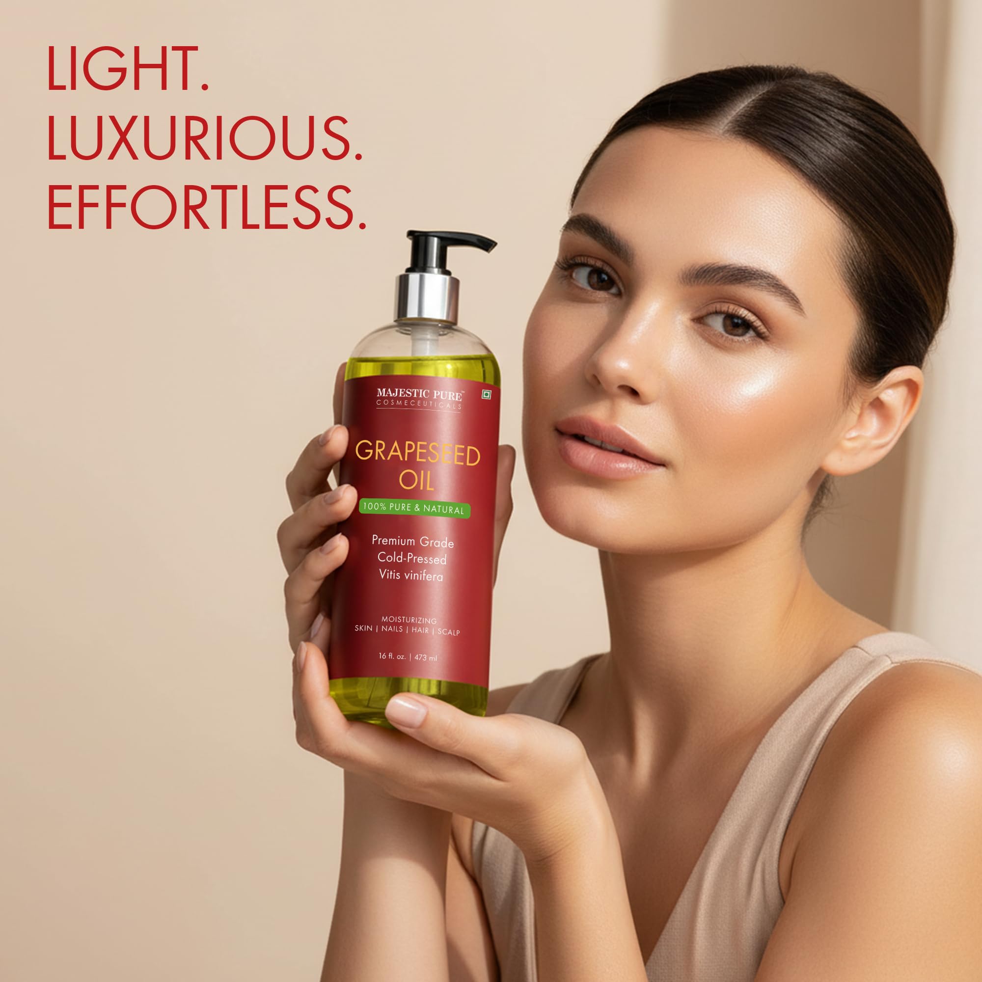 Majestic Pure Grapeseed Oil used for hair care to promote smoothness.