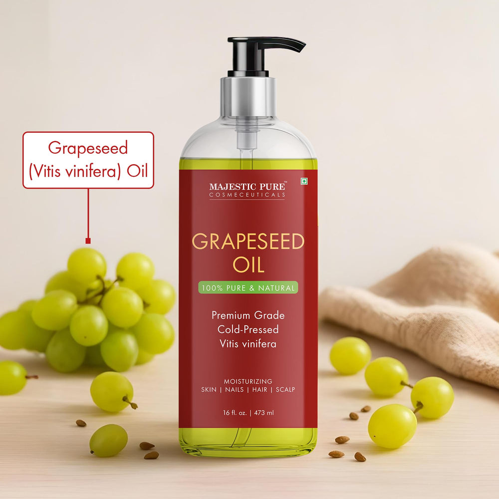 Pouring Majestic Pure Grapeseed Oil highlights its lightweight, fast-absorbing texture.