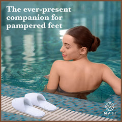 MAJI SIMPLY JOYOUS wedding-ready white slippers enhance guest comfort.