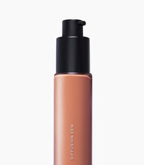 MAKE Beauty Diffusion Dew Skin Tint pump demonstrates smooth, lightweight application.