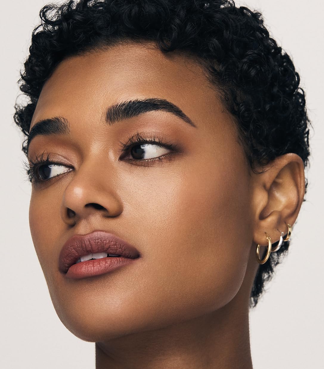 Lips wearing Lip Continuum demonstrate sharp versus soft definition.