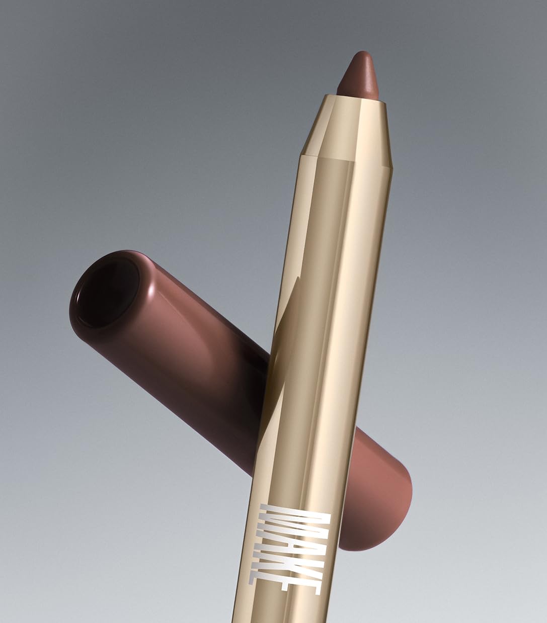 Compact packaging and built-in brush shown with MAKE Lip Continuum slate