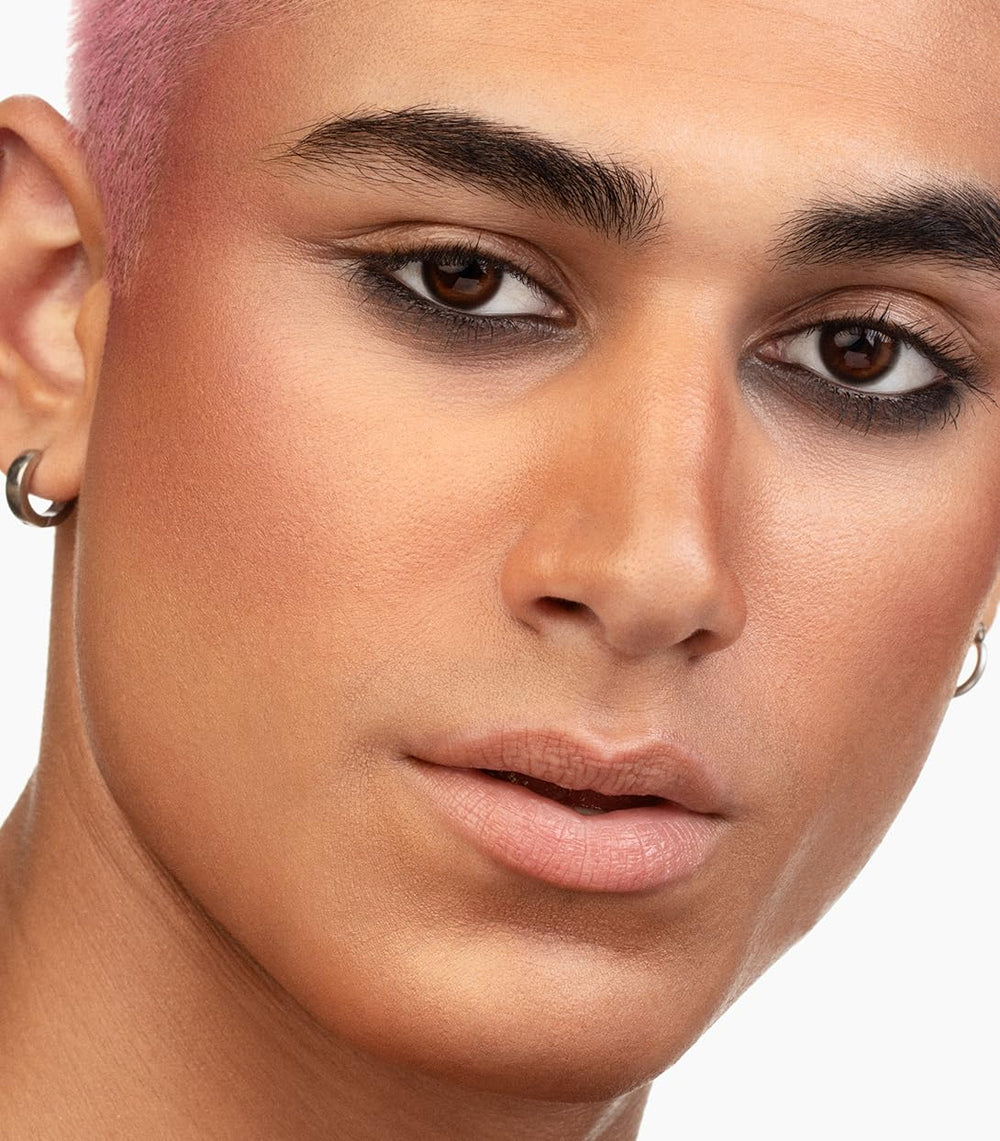 Amber Glow nude coral shade adds natural warmth to cheeks.