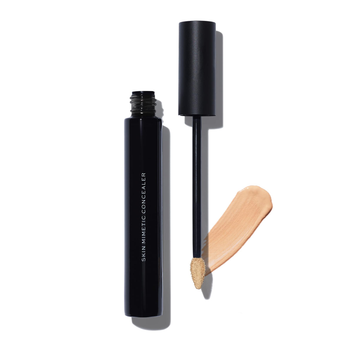 MAKE Beauty Skin Mimetic Concealer swatch showing natural buildable coverage