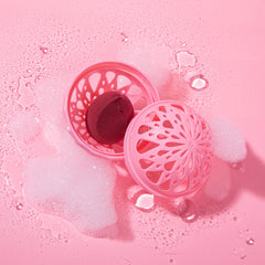 MakeUp Eraser Sponge with wash ball demonstrates easy machine washing