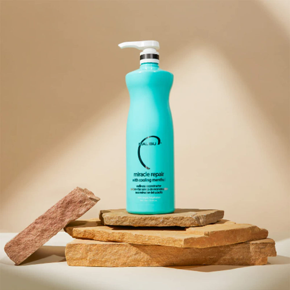 Malibu C Miracle Repair application on hair illustrating detangling ease