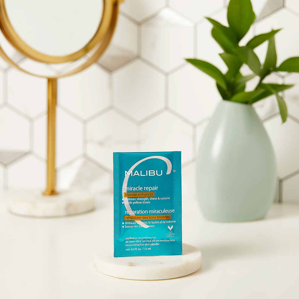 Shea butter and soy protein feature on packet, boosting gloss and radiance.