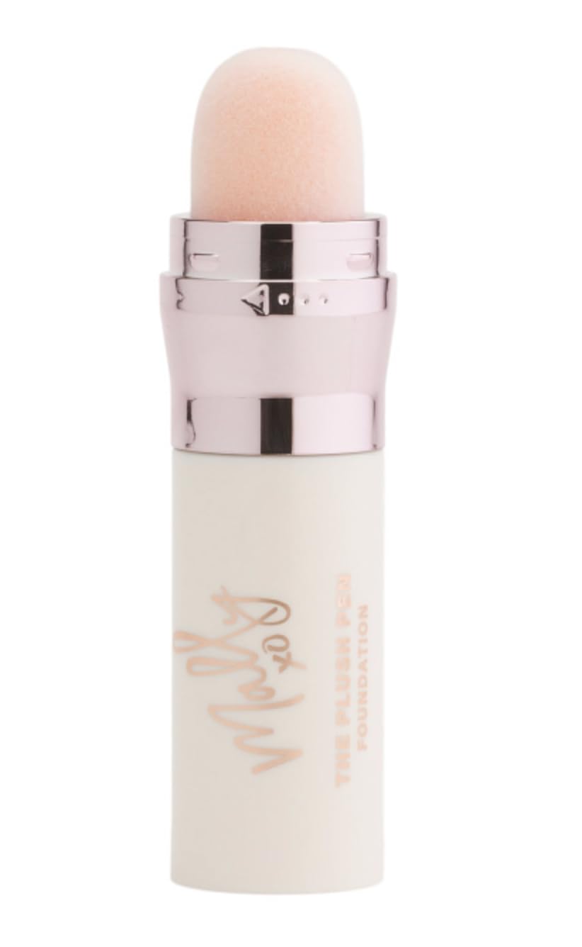 Blending with fingertips using Mally Plush Pen Brightening Foundation for a natural finish.