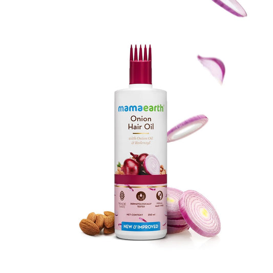 Mamaearth Onion Hair Oil ingredients close-up highlighting Redensyl and natural extracts.
