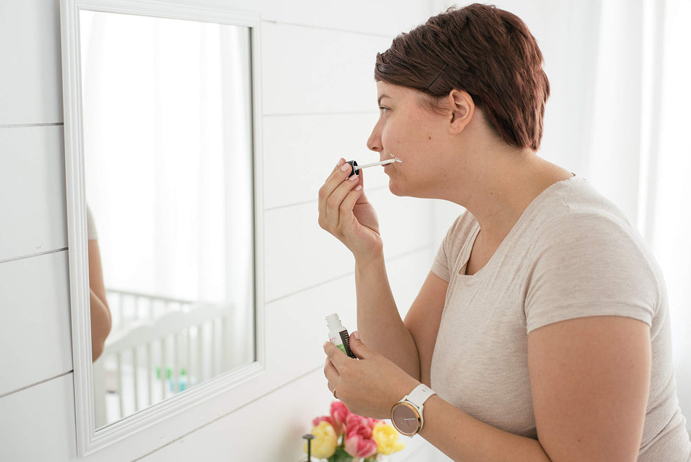 Evening skincare ritual with Mambino Organics blemish roll-on.