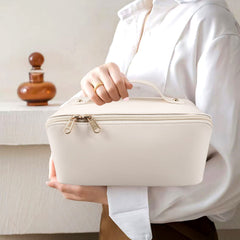 Interior pockets keep brushes and skincare neatly organized